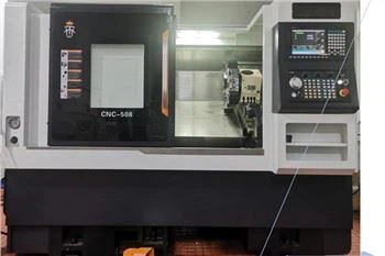 Máy tiện quay CNC